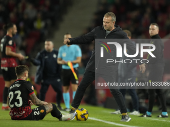 Hansi Flick head coach of Barcelona during the La Liga match between RCD Mallorca and FC Barcelona at Estadi de Son Moix on December 3, 2024...