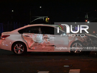 The NYPD investigates a collision involving an NYPD police cruiser and other vehicles during the pursuit of robbery suspects in the Laurelto...