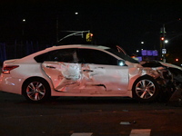 The NYPD investigates a collision involving an NYPD police cruiser and other vehicles during the pursuit of robbery suspects in the Laurelto...