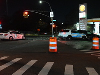 The NYPD investigates a collision involving an NYPD police cruiser and other vehicles during the pursuit of robbery suspects in the Laurelto...