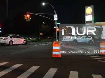 The NYPD investigates a collision involving an NYPD police cruiser and other vehicles during the pursuit of robbery suspects in the Laurelto...