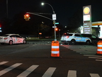 The NYPD investigates a collision involving an NYPD police cruiser and other vehicles during the pursuit of robbery suspects in the Laurelto...