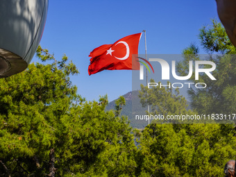 The Turkish flag is seen in the wind in Alanya, Antalya, Turkey, on November 5, 2024. (