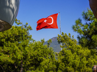 The Turkish flag is seen in the wind in Alanya, Antalya, Turkey, on November 5, 2024. (