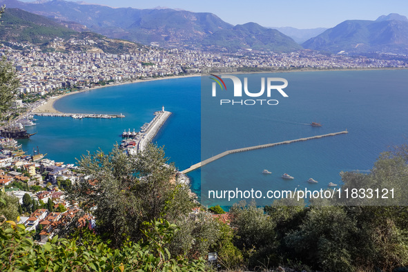 A general aerial view shows the dense urban development and the Mediterranean Sea coast in Alanya, Antalya, Turkey, on November 5, 2024. 