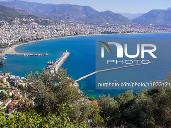 A general aerial view shows the dense urban development and the Mediterranean Sea coast in Alanya, Antalya, Turkey, on November 5, 2024. (