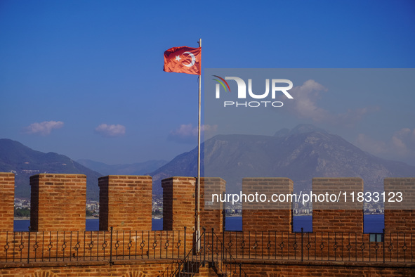 The Turkish flag on the top of Red Tower on Alanya Kalesi is seen in Alanya, Antalya, Turkey, on November 5, 2024. 