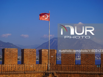 The Turkish flag on the top of Red Tower on Alanya Kalesi is seen in Alanya, Antalya, Turkey, on November 5, 2024. (