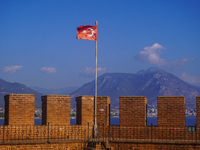 The Turkish flag on the top of Red Tower on Alanya Kalesi is seen in Alanya, Antalya, Turkey, on November 5, 2024. (