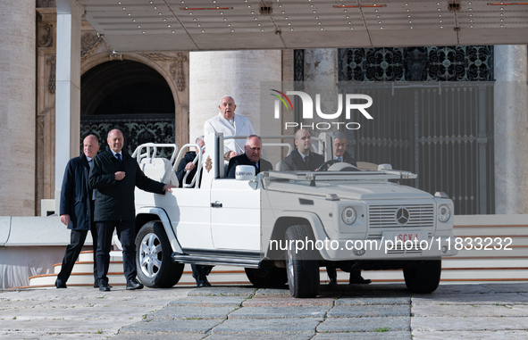 Pope Francis leaves after the weekly general audience in Saint Peter's Square, Vatican City, on December 4, 2024. 