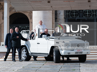 Pope Francis leaves after the weekly general audience in Saint Peter's Square, Vatican City, on December 4, 2024. (