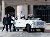 Pope Francis leaves after the weekly general audience in Saint Peter's Square, Vatican City, on December 4, 2024. (