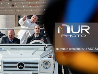 Pope Francis leaves after the weekly general audience in Saint Peter's Square, Vatican City, on December 4, 2024. (