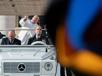 Pope Francis leaves after the weekly general audience in Saint Peter's Square, Vatican City, on December 4, 2024. (