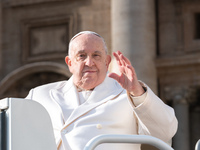 Pope Francis leaves after the weekly general audience in Saint Peter's Square, Vatican City, on December 4, 2024. (