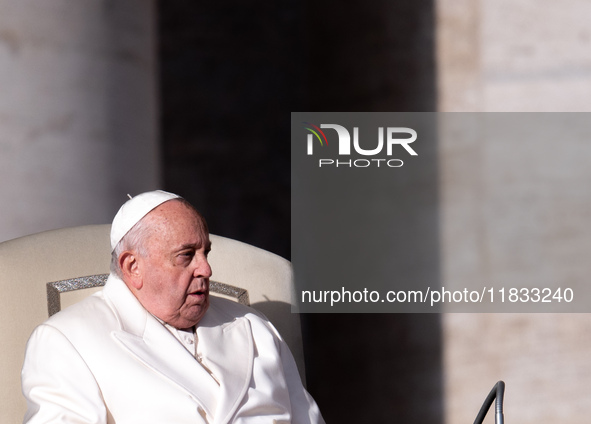 Pope Francis addresses a message to pilgrims during the weekly general audience in St. Peter's Square in Vatican City, on December 4, 2024. 