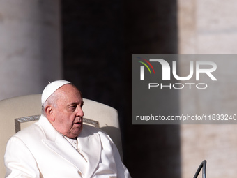 Pope Francis addresses a message to pilgrims during the weekly general audience in St. Peter's Square in Vatican City, on December 4, 2024....