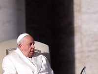 Pope Francis addresses a message to pilgrims during the weekly general audience in St. Peter's Square in Vatican City, on December 4, 2024....