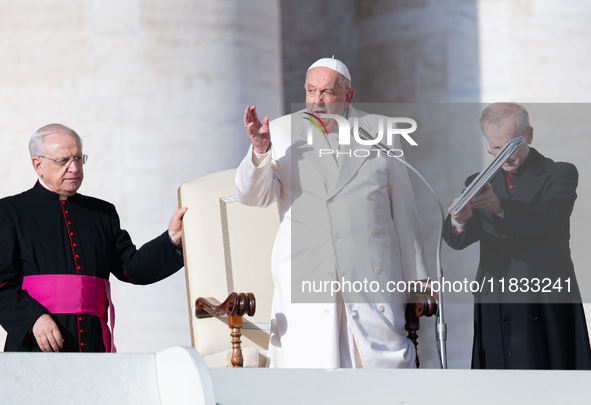 Pope Francis addresses a message to pilgrims during the weekly general audience in St. Peter's Square in Vatican City, on December 4, 2024. 