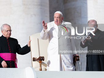 Pope Francis addresses a message to pilgrims during the weekly general audience in St. Peter's Square in Vatican City, on December 4, 2024....