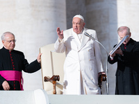 Pope Francis addresses a message to pilgrims during the weekly general audience in St. Peter's Square in Vatican City, on December 4, 2024....