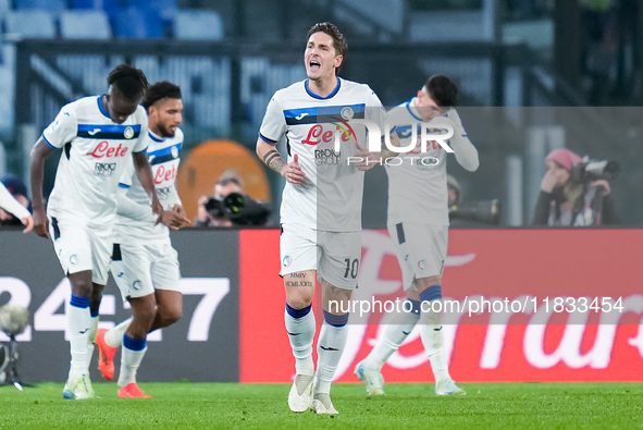 Nicolo Zaniolo of Atalanta BC celebrates after Marten de Roon scored first goal during the Serie A Enilive match between AS Roma and Atalant...