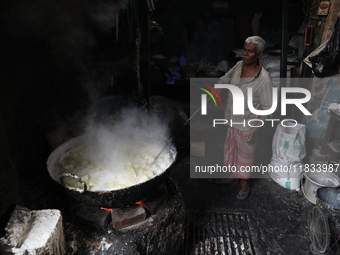 A worker prepares Indian sweet Petha inside a workshop in Kolkata, India, on December 4, 2024. (