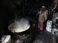 A worker prepares Indian sweet Petha inside a workshop in Kolkata, India, on December 4, 2024. (