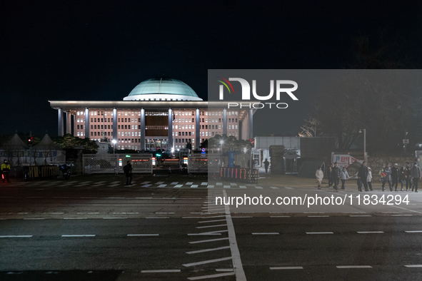 The front gate of the National Assembly in Yeouido, Seoul, South Korea, on December 4, 2024, remains calm and unchanged six hours after Pres...