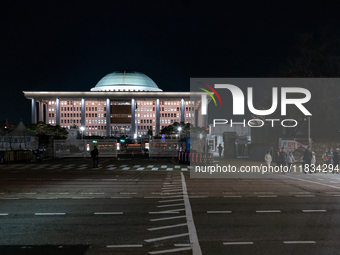 The front gate of the National Assembly in Yeouido, Seoul, South Korea, on December 4, 2024, remains calm and unchanged six hours after Pres...