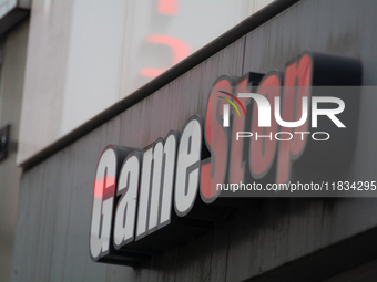 A general view of the GameStop retailer store logo in the city center of Cologne, Germany, as the game retailer plans to close all its store...