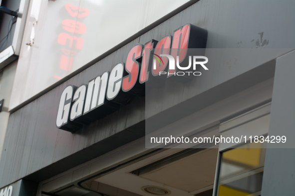 A general view of the GameStop retailer store logo in the city center of Cologne, Germany, as the game retailer plans to close all its store...