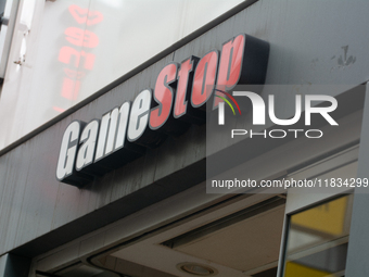 A general view of the GameStop retailer store logo in the city center of Cologne, Germany, as the game retailer plans to close all its store...