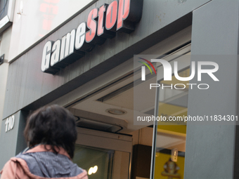 A general view of the GameStop retailer store logo in the city center of Cologne, Germany, as the game retailer plans to close all its store...