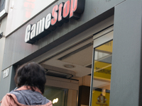 A general view of the GameStop retailer store logo in the city center of Cologne, Germany, as the game retailer plans to close all its store...