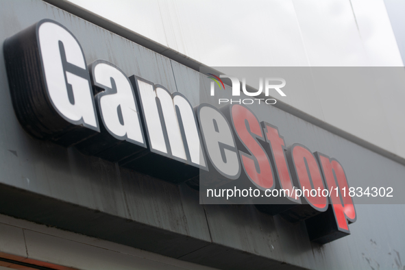 A general view of the GameStop retailer store logo in the city center of Cologne, Germany, as the game retailer plans to close all its store...