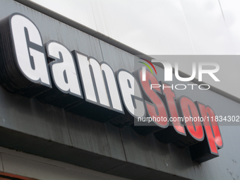 A general view of the GameStop retailer store logo in the city center of Cologne, Germany, as the game retailer plans to close all its store...