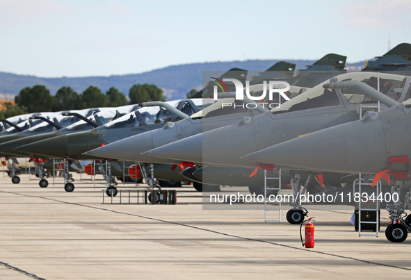 Dassault Rafale F4 of the Hellenic Air Force and Dassault Mirage 2000D of the Armee de l'Air park at Los Llanos military air base during the...