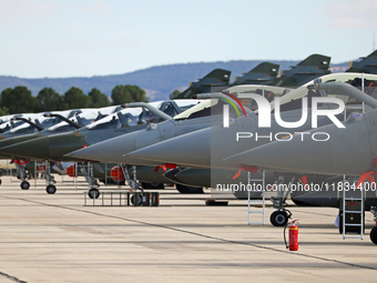 Dassault Rafale F4 of the Hellenic Air Force and Dassault Mirage 2000D of the Armee de l'Air park at Los Llanos military air base during the...