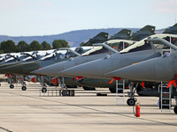 Dassault Rafale F4 of the Hellenic Air Force and Dassault Mirage 2000D of the Armee de l'Air park at Los Llanos military air base during the...