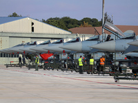 Various Eurofighter EF-2000 Typhoons are parked at Los Llanos military air base during the Tactical Leadership Programme in Albacete, Spain,...