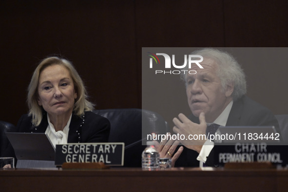 Former Chilean President Sebastian Pinera's wife, Cecilia Morel, and OAS Secretary Luis Almagro pay tribute during an OAS regular meeting in...