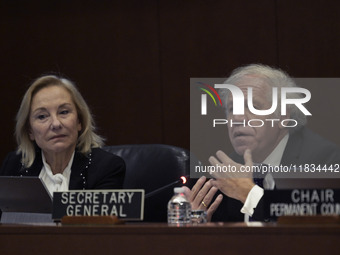 Former Chilean President Sebastian Pinera's wife, Cecilia Morel, and OAS Secretary Luis Almagro pay tribute during an OAS regular meeting in...