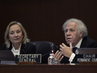 Former Chilean President Sebastian Pinera's wife, Cecilia Morel, and OAS Secretary Luis Almagro pay tribute during an OAS regular meeting in...