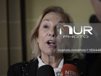 Former Chilean President Sebastian Pinera's wife, Cecilia Morel, speaks with a journalist during an OAS regular meeting in Washington DC, US...