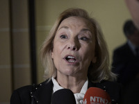 Former Chilean President Sebastian Pinera's wife, Cecilia Morel, speaks with a journalist during an OAS regular meeting in Washington DC, US...