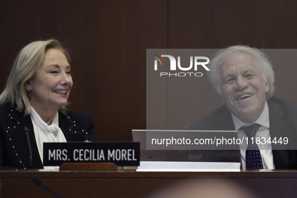 Former Chilean President Sebastian Pinera's wife, Cecilia Morel, and OAS Secretary Luis Almagro pay tribute during an OAS regular meeting in...