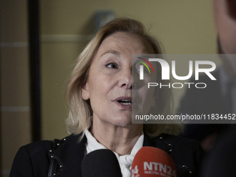 Former Chilean President Sebastian Pinera's wife, Cecilia Morel, speaks with a journalist during an OAS regular meeting in Washington DC, US...