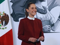 Mexico's President Claudia Sheinbaum speaks during a briefing conference to announce that, as of January 1, 2025, the minimum salary increas...