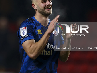 Charlie Barker of Crawley Town celebrates victory at the end of the game during the Sky Bet League 1 match between Charlton Athletic and Cra...